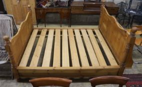 A king size pine bed frame with side rails and slats, width 170cm, length 213cm