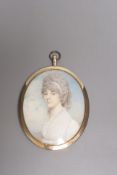 A portrait miniature on ivory of a lady by Charles Hayter, 1797; signed and dated, seed pearl tied