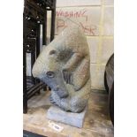 An African carved stone sculpture of an anteater, height 44cm