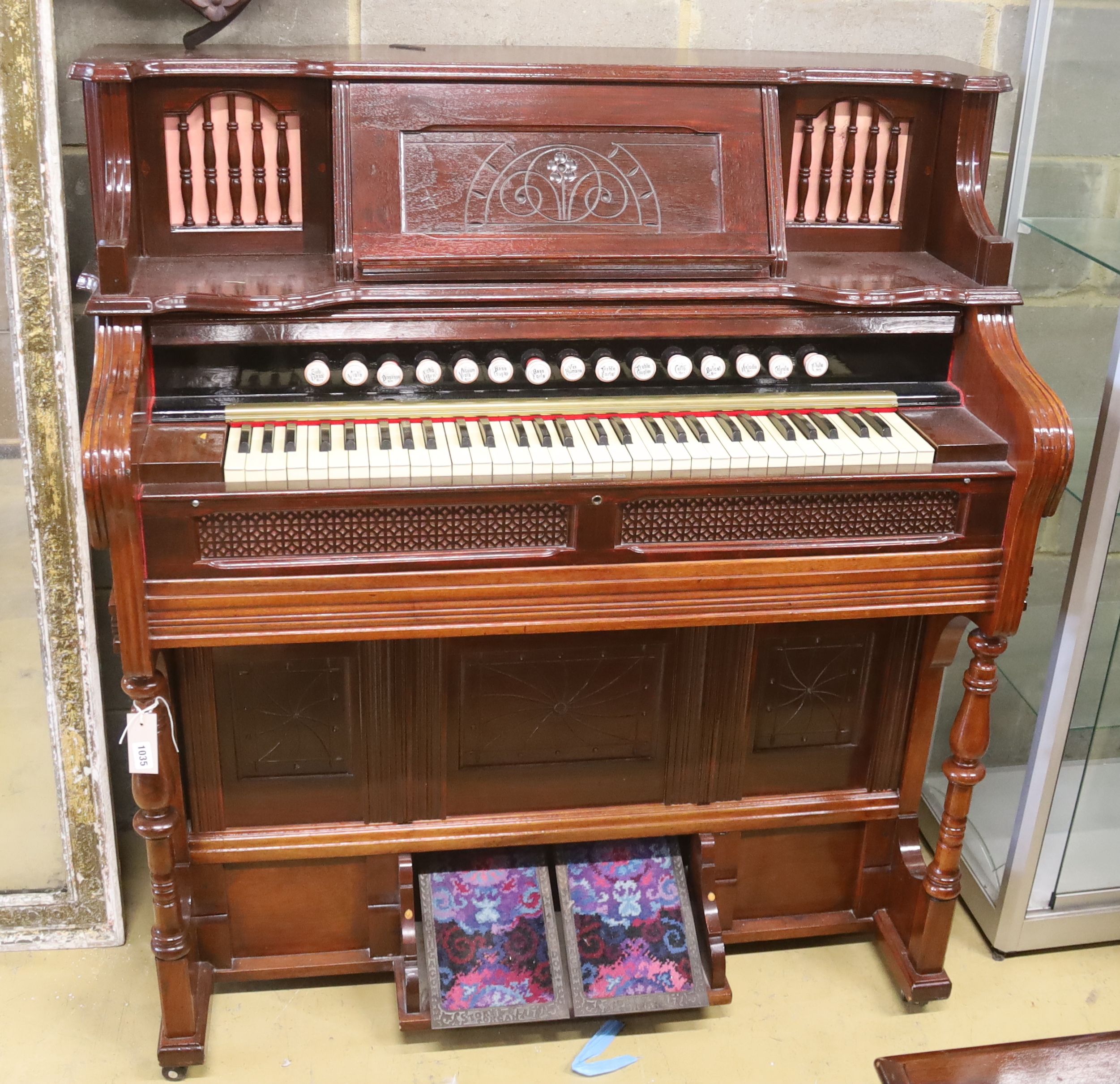 A late Victorian mahogany harmonium, width 120cm, depth 60cm, height 130cm