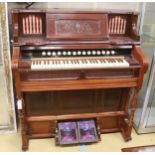 A late Victorian mahogany harmonium, width 120cm, depth 60cm, height 130cm