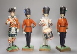 Four Dresden porcelain models of soldiers: Irish Guards, Drummer 3rd Guards, The Welsh Guards and