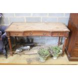 A French walnut dressing table, width 143cm, depth 59cm, height 79cm (a.f.)