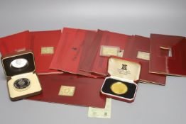 A quantity of silver gilt stamp replicas 'The Empire Collection'