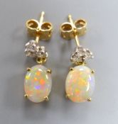 A modern pair of yellow metal, white opal and diamond set drop earrings, 17mm, gross 3.1 grams.