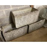 A set of three reconstituted stone rectangular garden planters with claw feet, width 77cm, depth