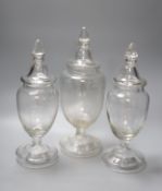 A garniture of three Victorian glass sweet jars, tallest 34cm