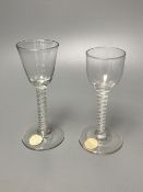 Two George III double series opaque twist stem cordial glasses, c.1765, with funnel and ogee