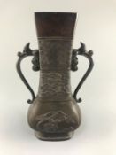 A Chinese bronze two handled flower vase, Ming dynasty,