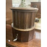 A Victorian mahogany circular night commode, the top with a needlework inset panel, 42cm diameter,