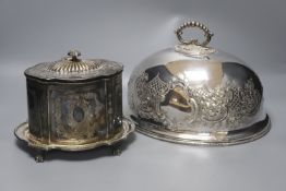 A French silver plated biscuit barrel and a meat dish cover