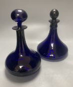 Two 19th century Bristol blue glass ship's decanters, tallest 20cm excluding stopper
