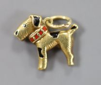A modern 585 yellow metal and two colour enamel set Scottie dog pendant, 12mm, gross 0.8 grams.