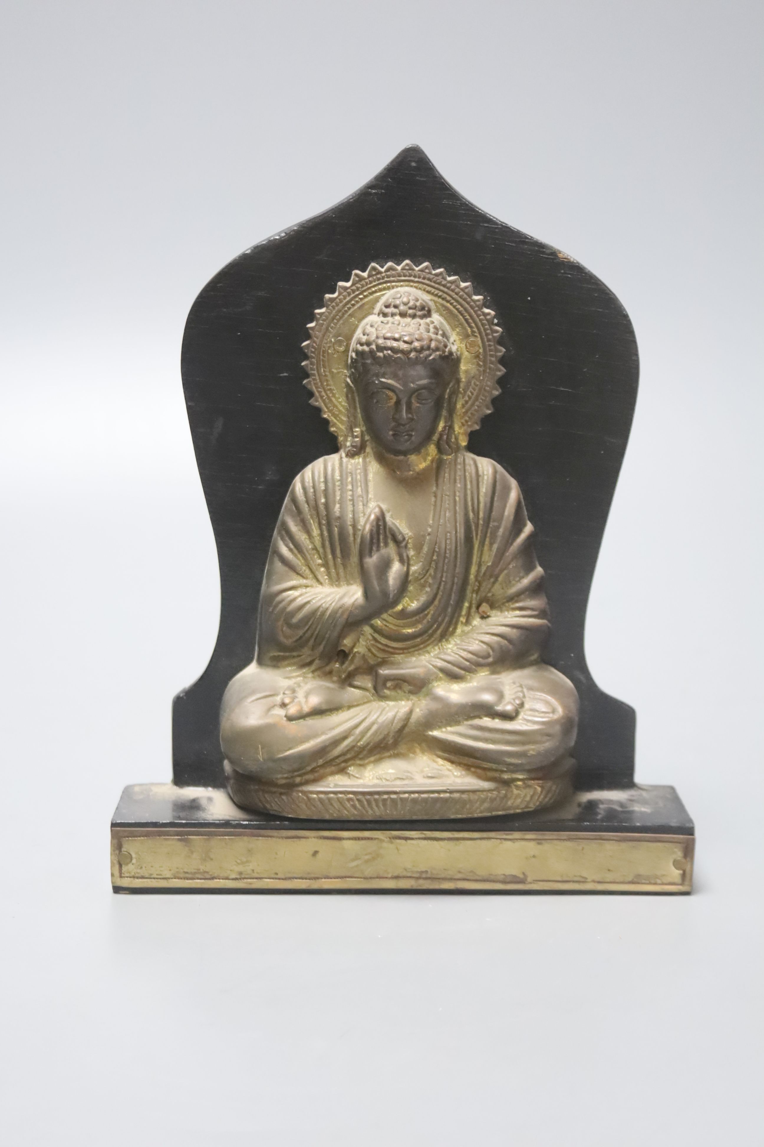 A Chinese or Tibetan gilt bronze seated Buddha, height 19cm