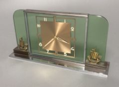 An Art Deco chrome and glass mantel timepiece, width 22cm