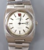 A gentleman's stainless steel Omega Megaquartz 32KHz wrist watch, on stainless steel Omega bracelet,