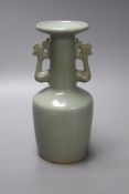 A celadon crackle-glaze twin handled vase, height 25cm