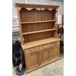 A Victorian style pine dresser, length 137cm, depth 45cm, height 200cm