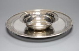 An early to mid 20th century Tiffany & Co sterling platter, 27.2cm and bowl, with pierced borders,