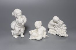 Kai Neilsen (1882-1924) for Bing & Grondahl, three white porcelain groups of children or cherubs,