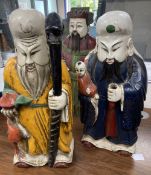 A trio of polychrome painted carved Chinese hardwood figures, tallest 67cm