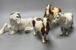 Three Beswick ponies and a Doulton horse, tallest 16.5cm