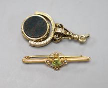 A Victorian yellow metal overlaid, bloodstone and sardonyx set swivelling fob seal, 42mm and a