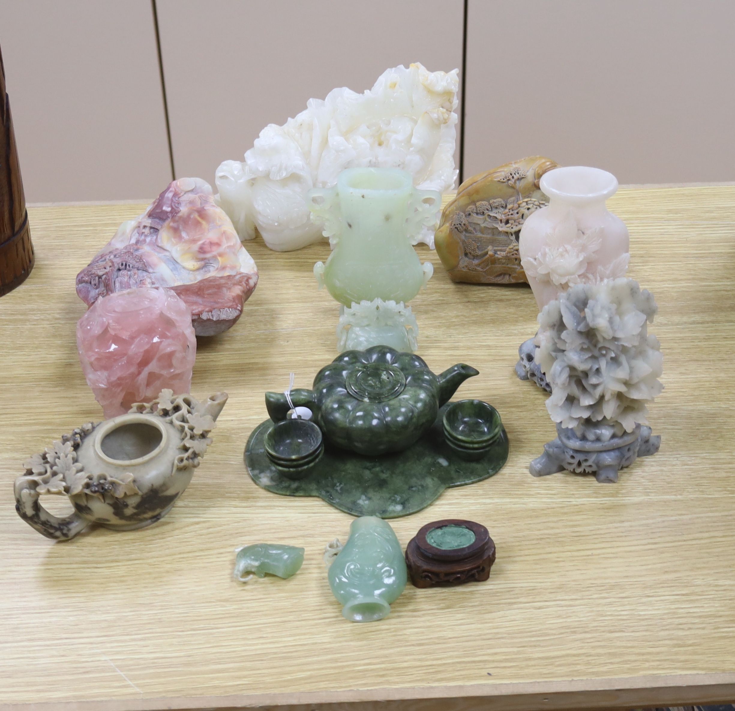 A group of Chinese hardstone and soapstone vessels and boulder carvings, largest 23cm