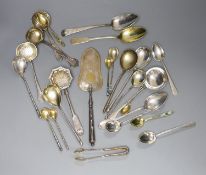 A late 19th century Russian 84 zolotnik tea strainer, a Russian cake slice and sugar sifter and a