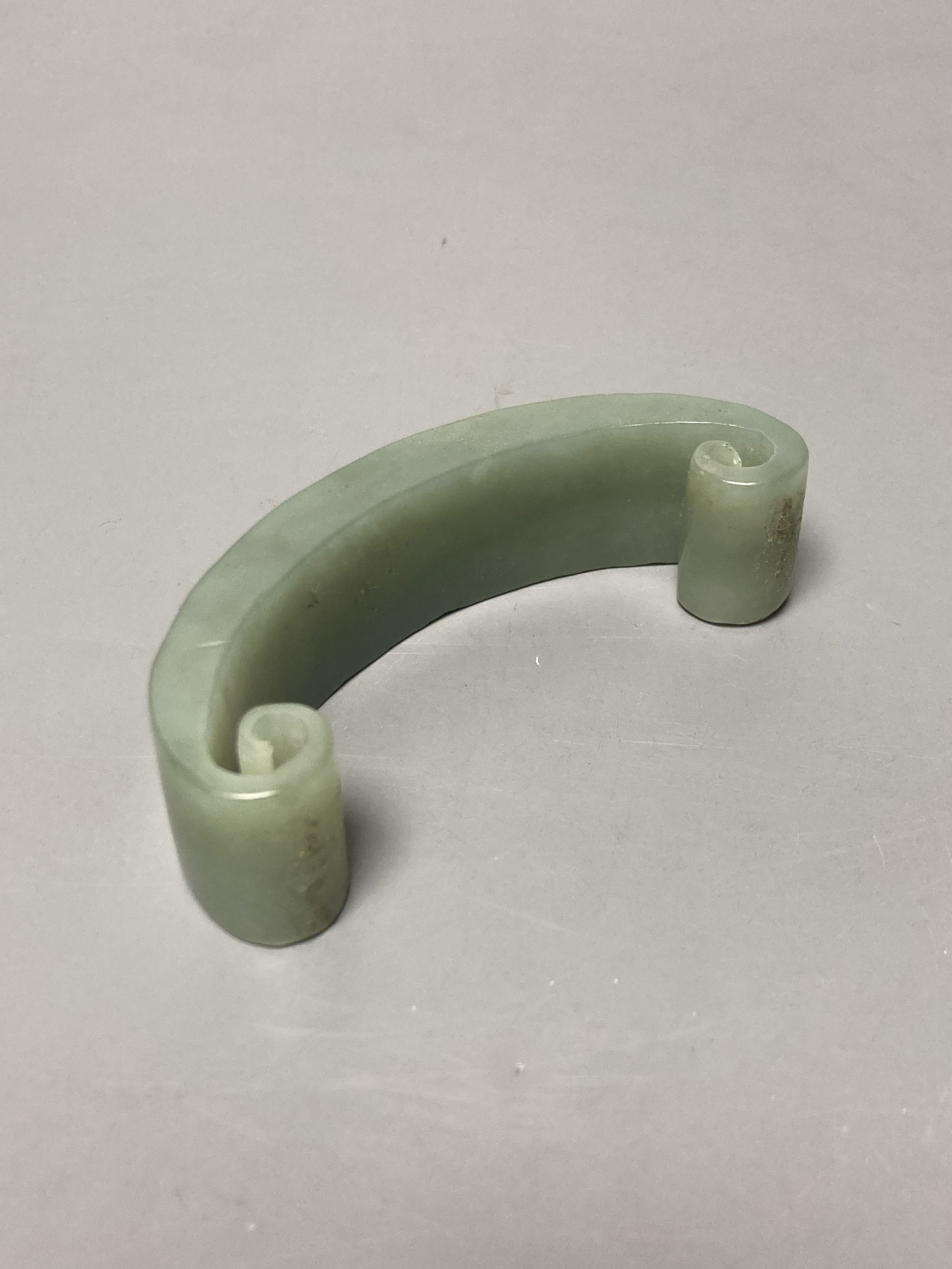 A Japanese bamboo wrist wrest, a Chinese jadeite, bamboo scoop and wooden carving possibly Zitan, - Image 3 of 5