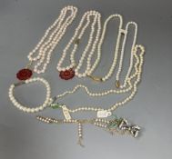 Four assorted modern single strand cultured pearl necklaces, longest 83cm, one other 9ct and