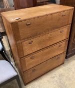 A mid century Cotswolds School oak fall front four division chest, width 91cm, depth 45cm, height