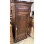 A Victorian walnut single door wardrobe, of narrow proportions, width 85cm, depth 42cm, height