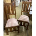 A set of six early 20th century oak Arts & Crafts style dining chairs