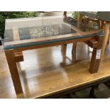A John Makepeace square glass top coffee table, width 64cm, height 35cm