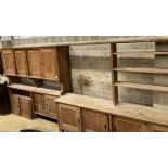 Two mid century pine and fruitwood sliding door household cupboards, larger 245cm, depth 47cm,