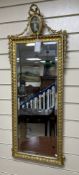 A 19th century giltwood and gesso rectangular chimney glass with faux jasperware pediment, width