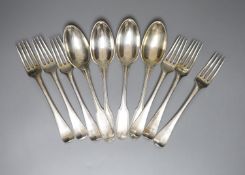 A set of six continental white metal dessert forks by A.Manz and four white metal table spoons,