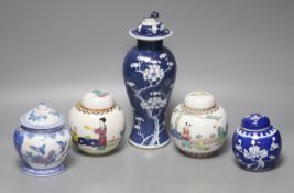 A Chinese blue and white vase and cover, a pair of famille rose jars and covers and two other jars