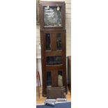 A large and unusual 20th century oak cased longcase clock, in the arts and crafts style, after
