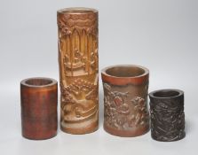 Four Chinese wood and bamboo brush pots, tallest 32cm