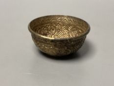 A Sino-Tibetan repousse base metal tea bowl, diameter 8cm