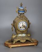 A 19th century French gilt metal and enamel mantel clock
