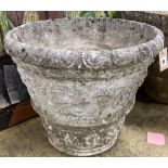 A pair of reconstituted stone circular garden urns, diameter 55cm, height 48cm