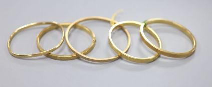 Two modern 9ct gold bangles, one hinged, 33.5 grams and three 9ct gold filled hinged bangles.