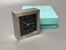 A boxed Tiffany alarm clock, 9 x 8cm