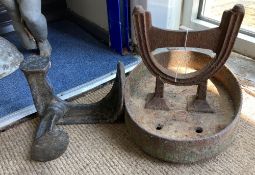 A Victorian cast iron boot scraper, width 33cm, height 26cm together with a cast iron Cobbler's