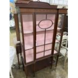 An Edwardian inlaid mahogany display cabinet, width 106cm, depth 38cm, height 180cm