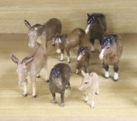 Four Beswick Shetland ponies and four Beswick donkeys