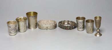 Six assorted early 20th century Russian 84 zolotnik tots, tallest 74mm, a similar enamelled bracelet